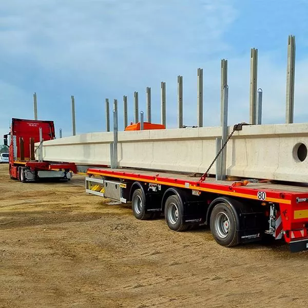 Hvordan reduserer standard bjelketransport semitrailere overdimensjonerte lastetransportrisikoer og flåtedriftskostnader?