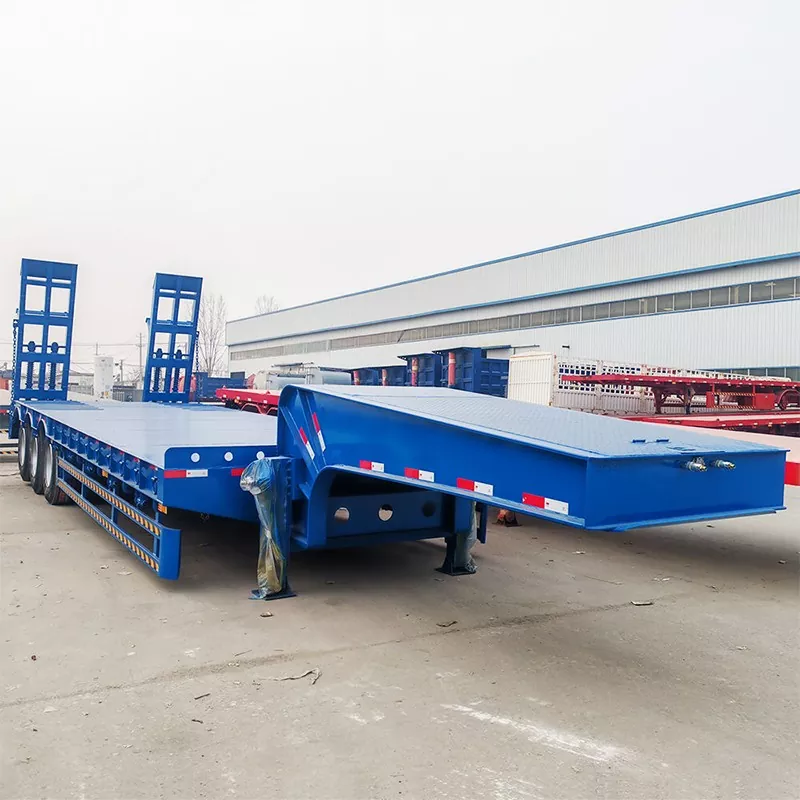 Hvorfor er en semitrailer med lav seng nødvendig for tung transport?